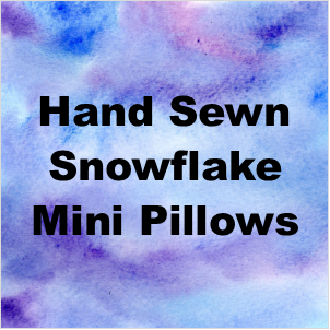 Words "Hand Sewn Snowflake Mini Pillows"