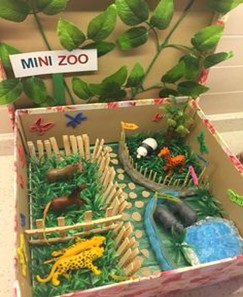 decorated box with zoo figurines 