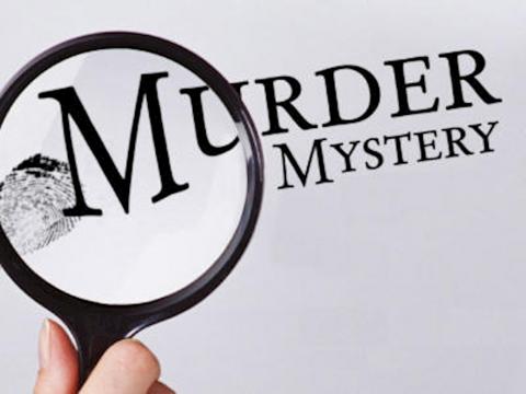 Magnifying glass being held by hand is looking at the text "Murder Mystery" on a white back-drop