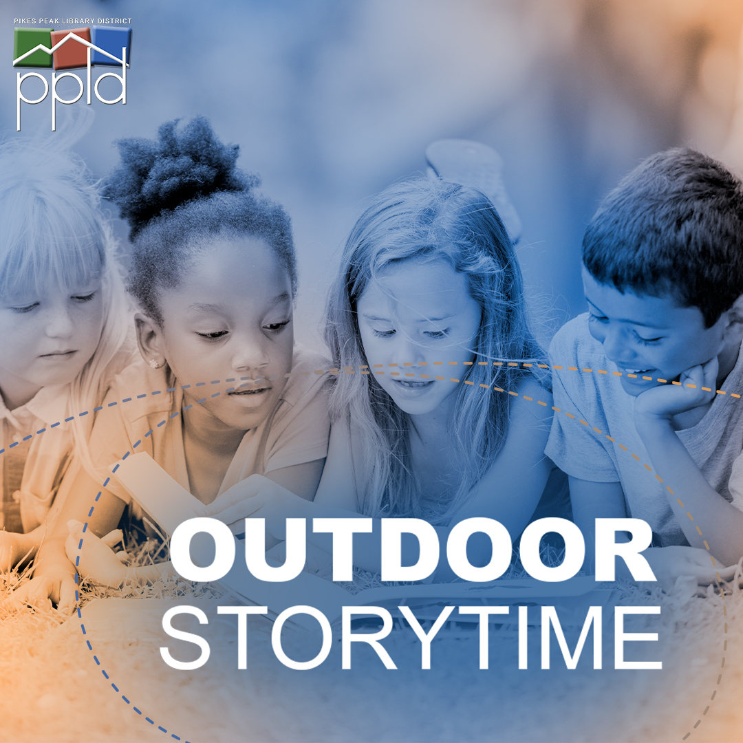 Outdoor storytime with three children reading