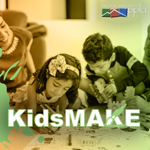KidsMAKE with two children working on a project
