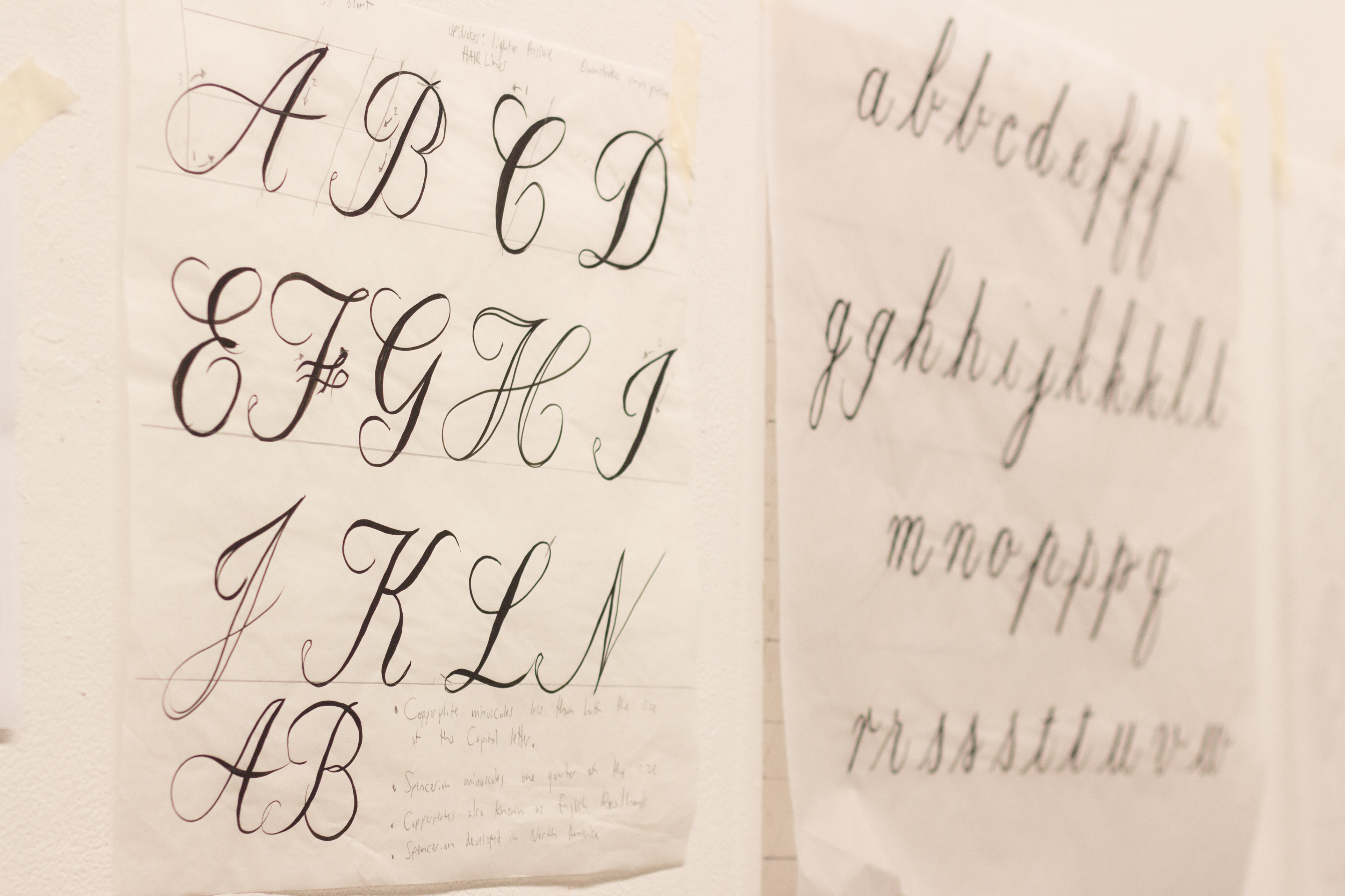 A picture of letters written in calligraphy.