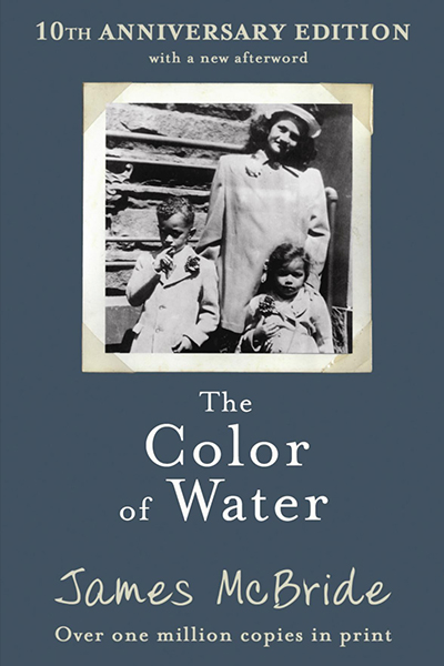 The cover of the book "The Color of Water: A Black Man's Tribute to his White Mother" by James McBride. It shows a dark blue background with the center of the cover showing a family portrait in black and white. The picture shows a woman standing behind two young children.