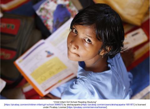 Child looking at book