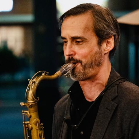 photo of Ricky Sweum playing the saxophone