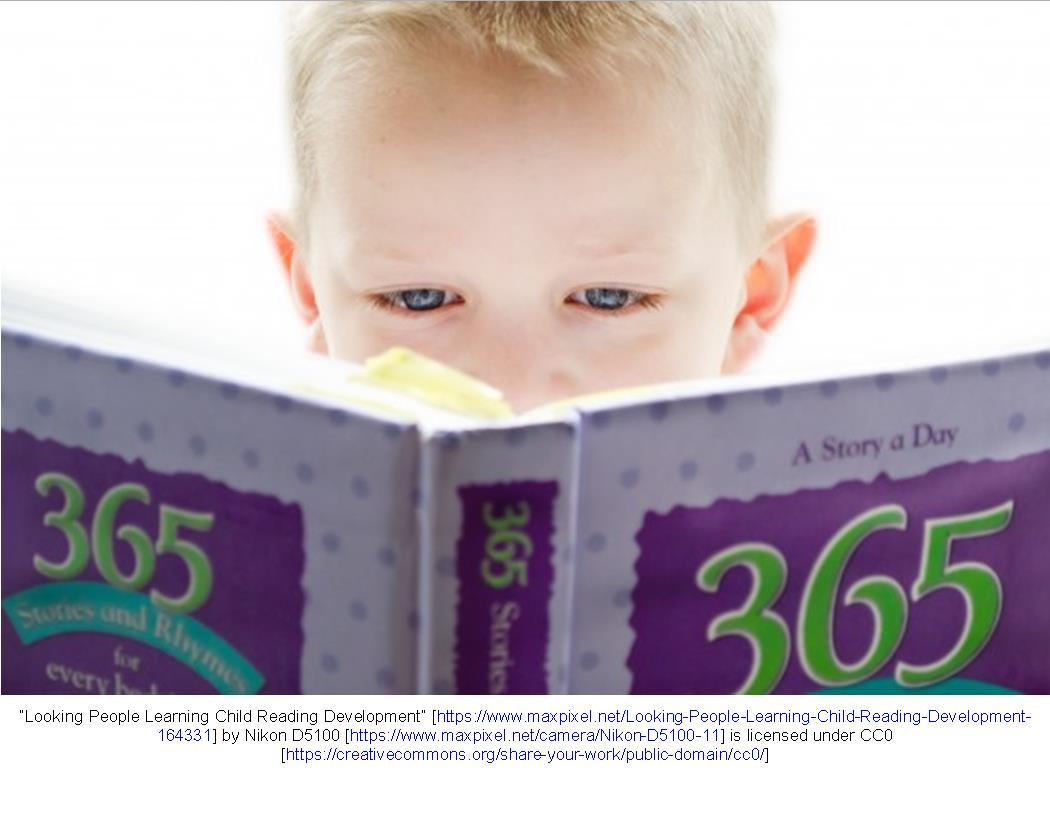 Child looking at book